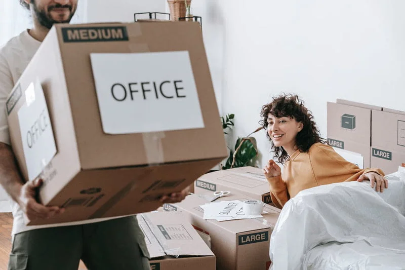 Office Relocation by Moovers Chicago Movers handling office relocation boxes, Moovers Chicago.