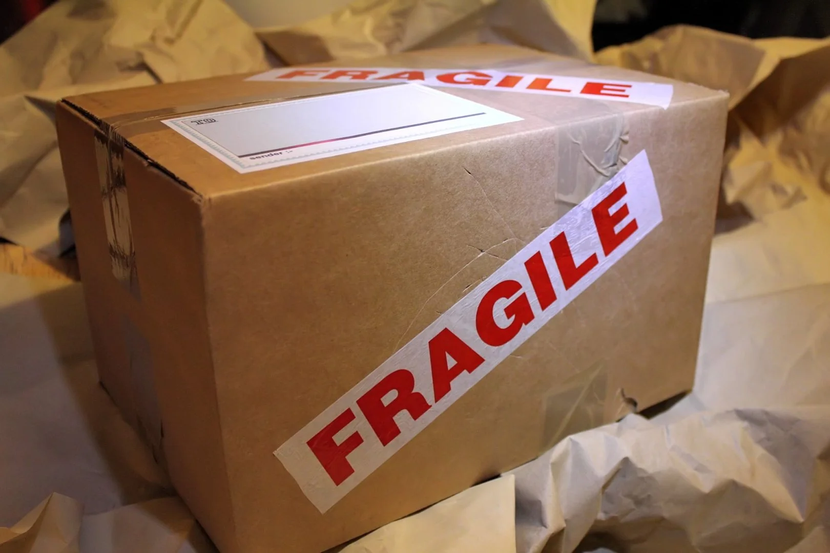 Fragile Box for Moving Cardboard box labeled fragile, ideal for moving services.
