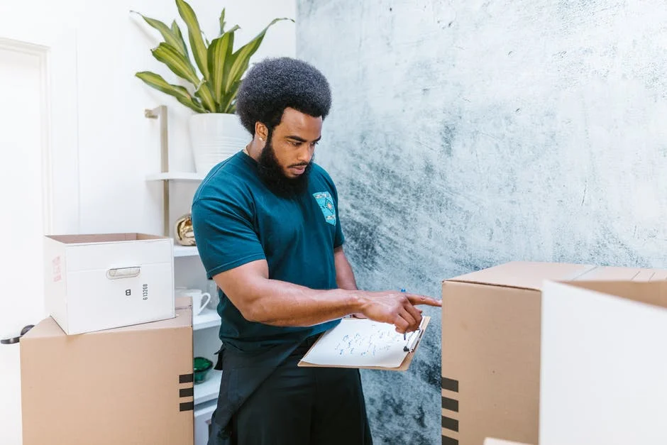 Professional Movers at Moovers Chicago Mover organizing boxes for Moovers Chicago moving company.