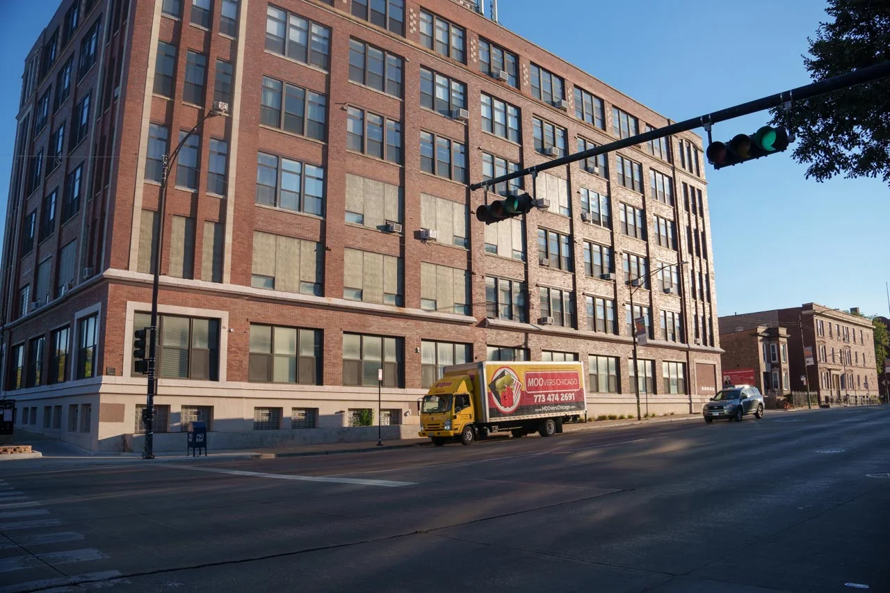 Moovers Chicago Moving Truck Moovers Chicago moving truck parked on a city street.