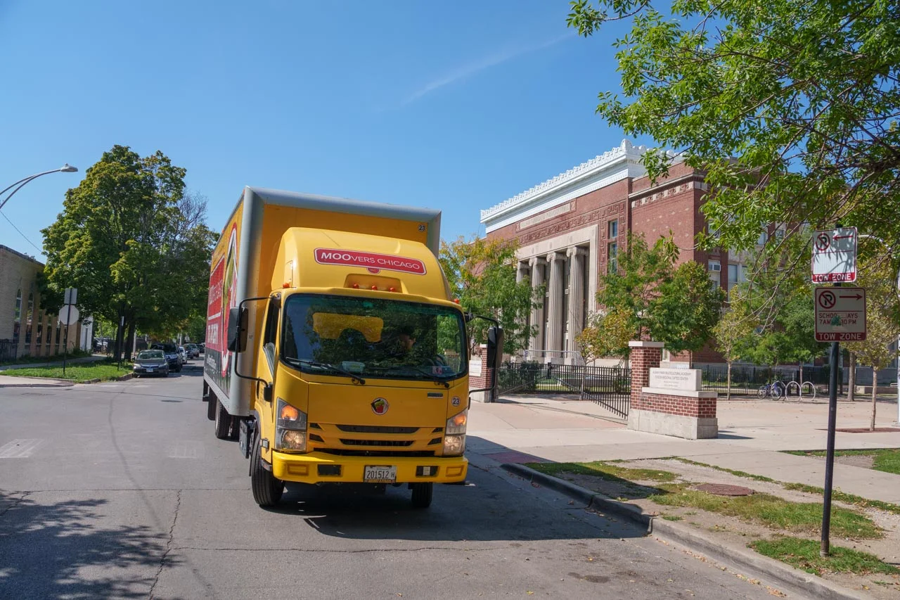 Moovers Chicago Truck in Albany Moovers Chicago truck parked on a street, offering local and long-distance moving services.