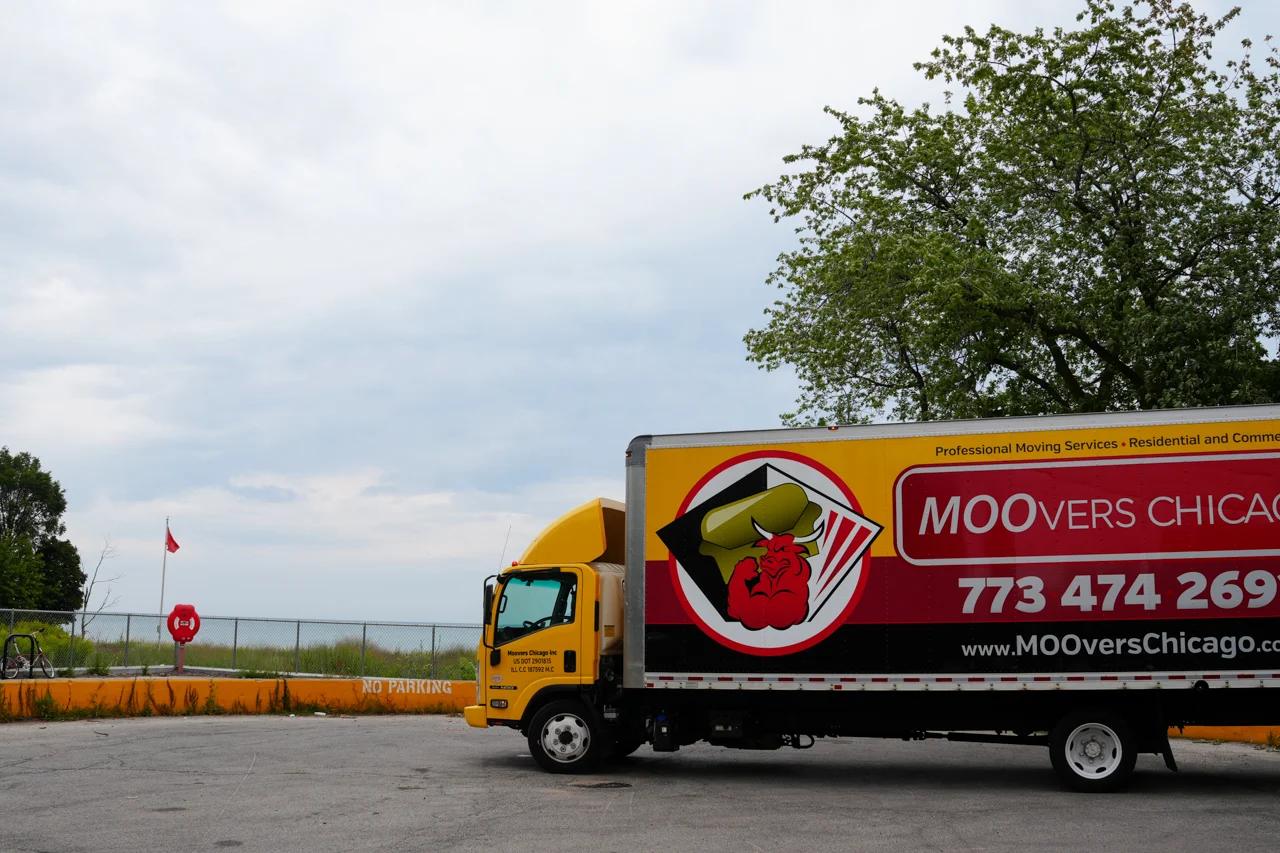 Moovers Chicago Truck in Rogers Moovers Chicago moving truck parked in Rogers, offering local and long distance moving services.