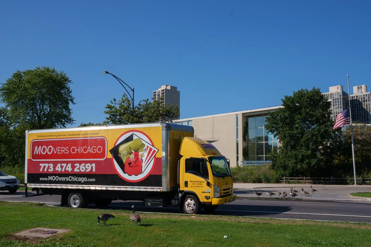 Moovers Chicago Truck Moovers Chicago truck parked, offering local and long distance moving services.