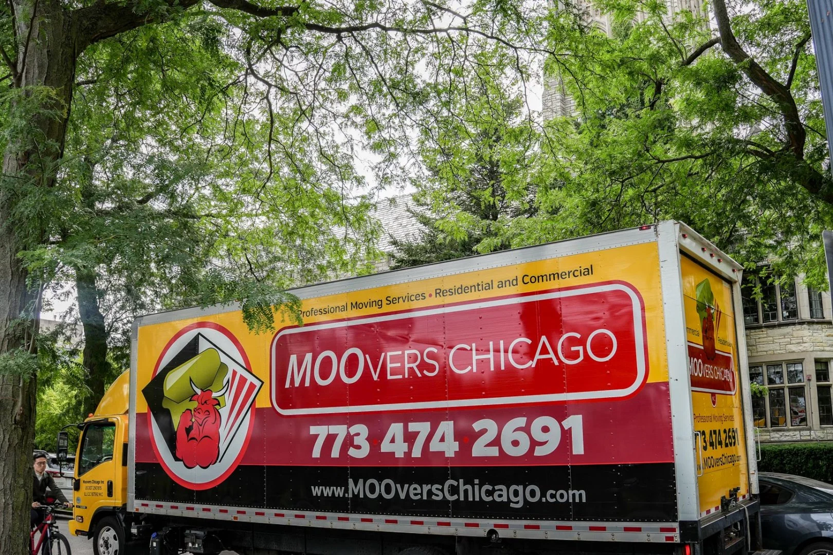 Moovers Chicago Moving Truck Moovers Chicago moving truck parked under trees, offering local and long-distance moving services in Evanston, IL.
