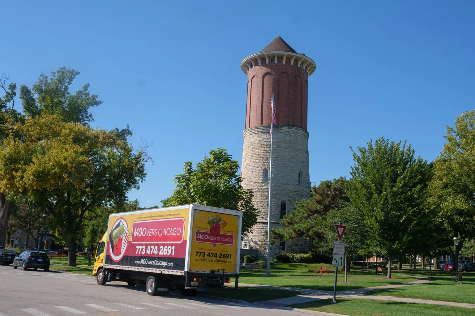 Moovers Chicago Truck Near Historic Tower Moovers Chicago truck parked near a historic tower, offering moving services in Western Springs, IL..
