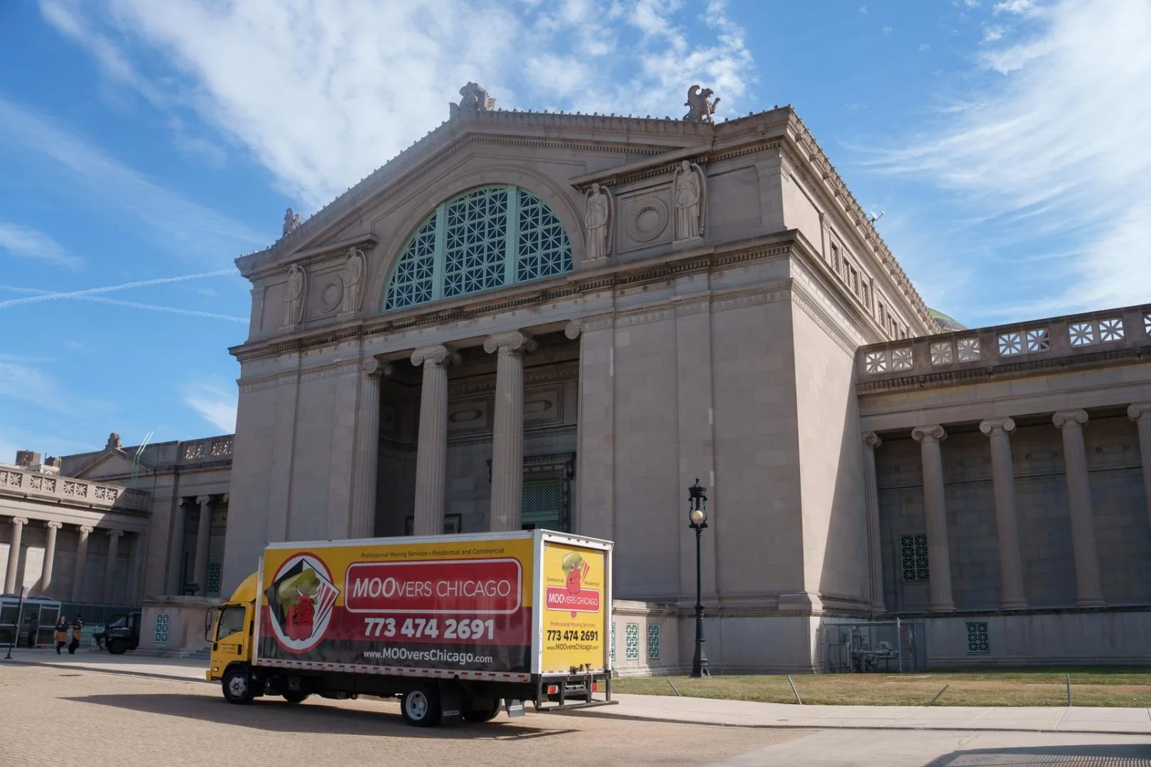 Moovers Chicago Truck at Historic Site Moovers Chicago truck parked in front of a historic building, offering local and long distance moving services in Hyde Park, IL.