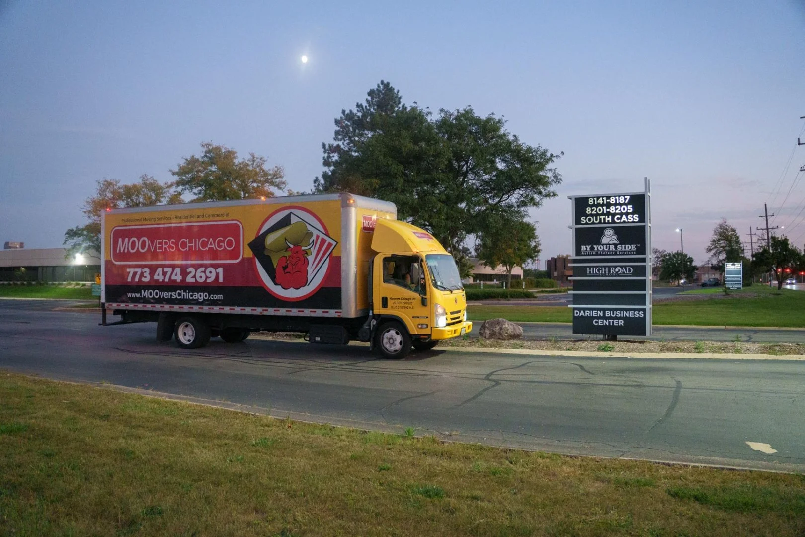 Moovers Chicago Truck at Business Center Moovers Chicago truck parked near a business center, offering local and long distance moving services in Darien, IL.