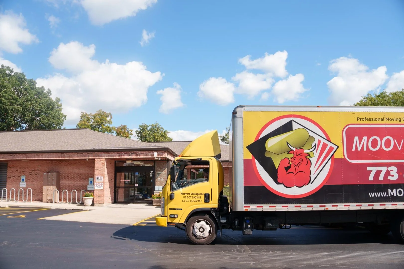 Moovers Chicago Truck Moovers Chicago truck parked outside a building, offering professional moving services in Round Lake, IL.