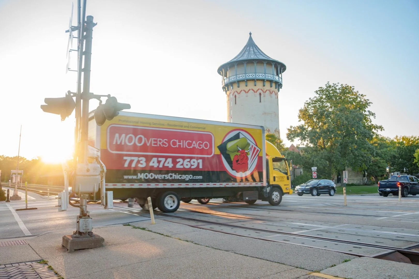Moovers Chicago Truck at Railway Crossing Moovers Chicago truck at railway crossing, local and long distance moving services Riverside, Illinois.