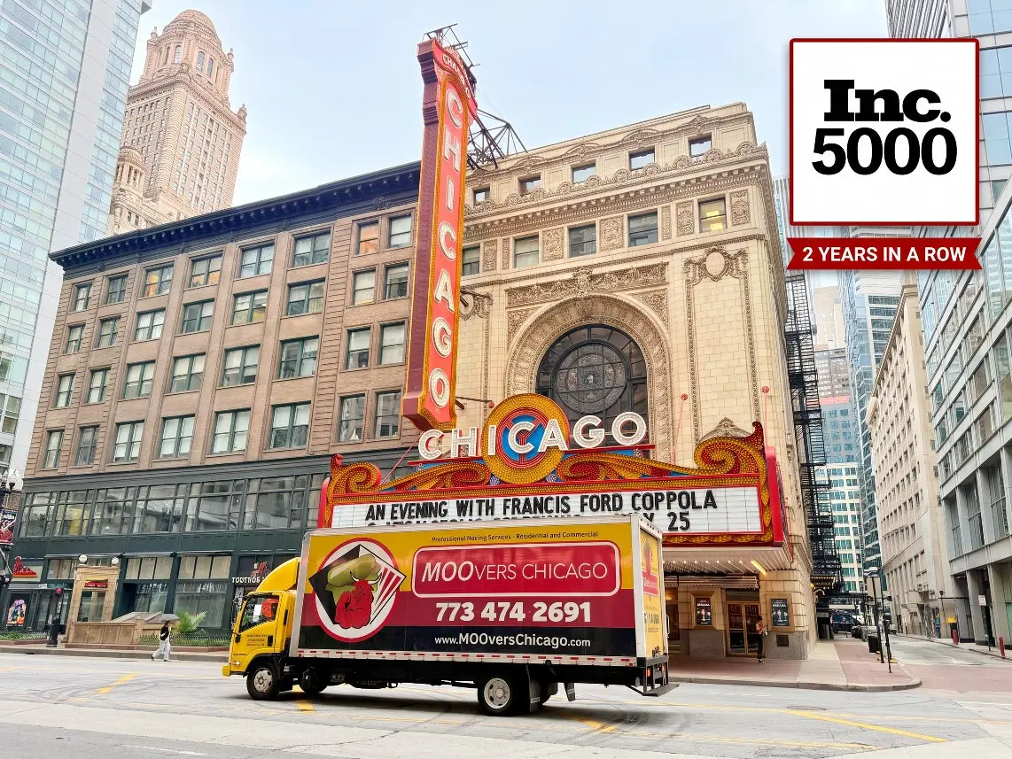 Moovers Chicago Truck at Chicago Theater Moovers Chicago truck in front of iconic Chicago theater.