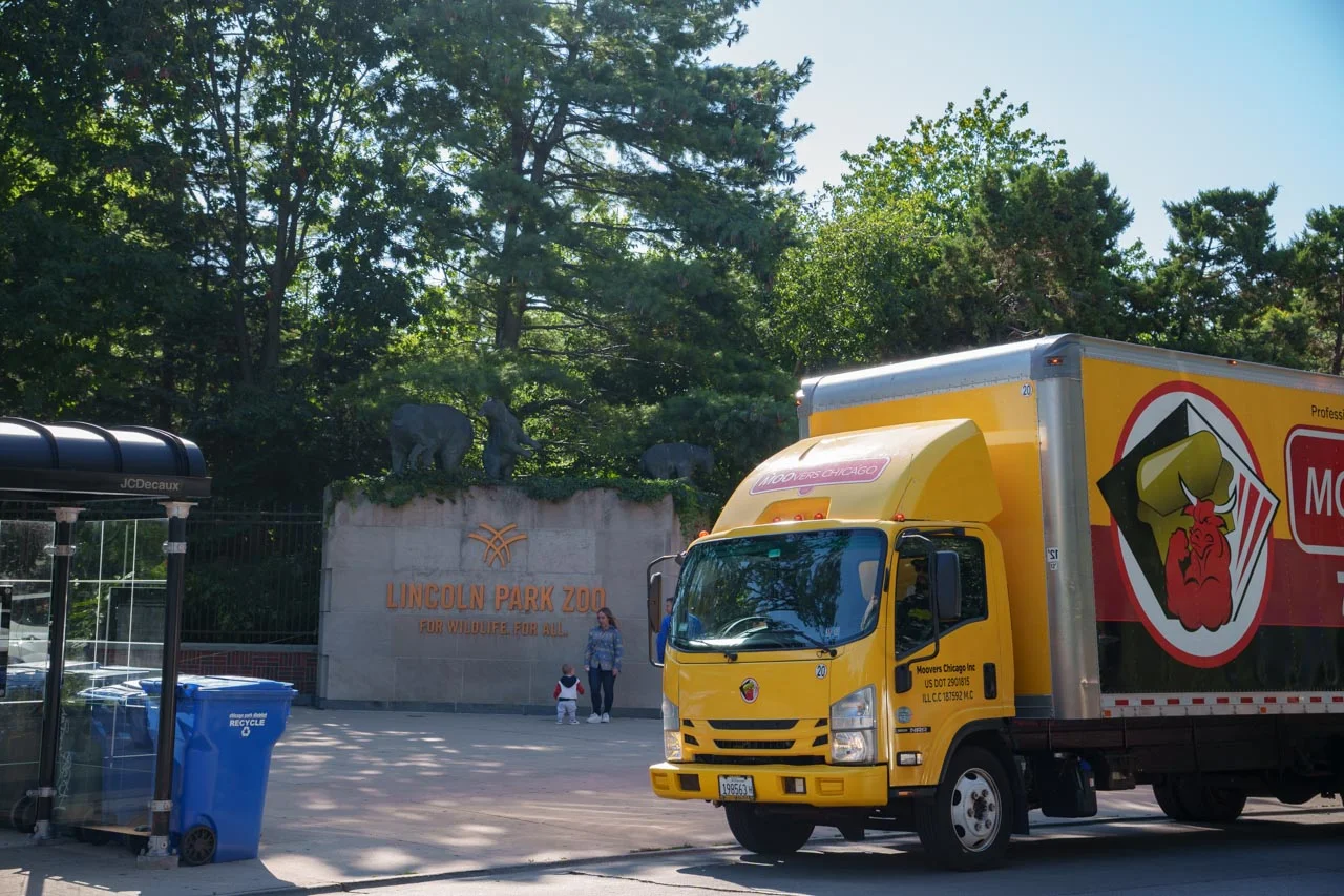 Moovers Chicago truck at Lincoln Park Zoo entrance, local moving services.