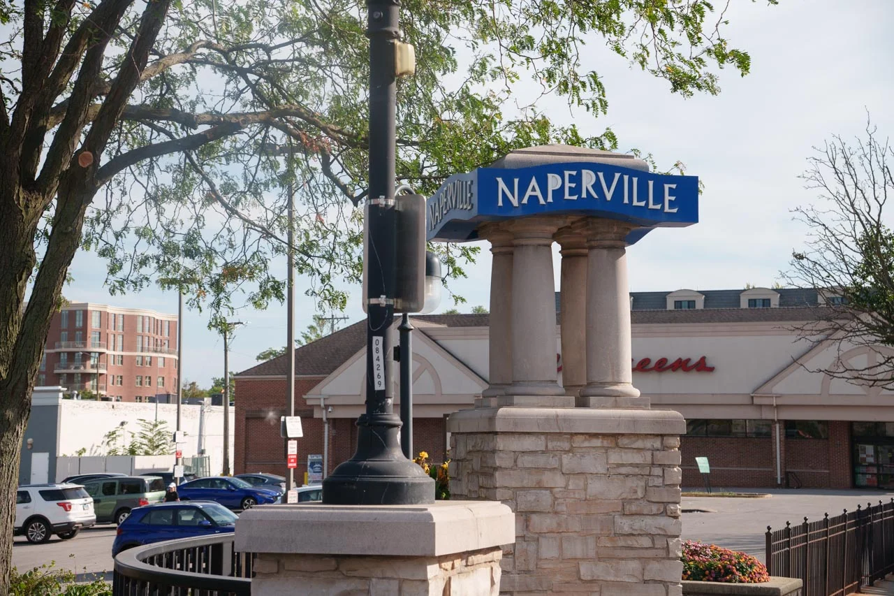 Naperville sign near Walgreens, local moving services available in Naperville,IL.