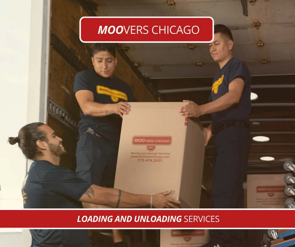 Moovers Chicago team loading a moving truck with boxes.