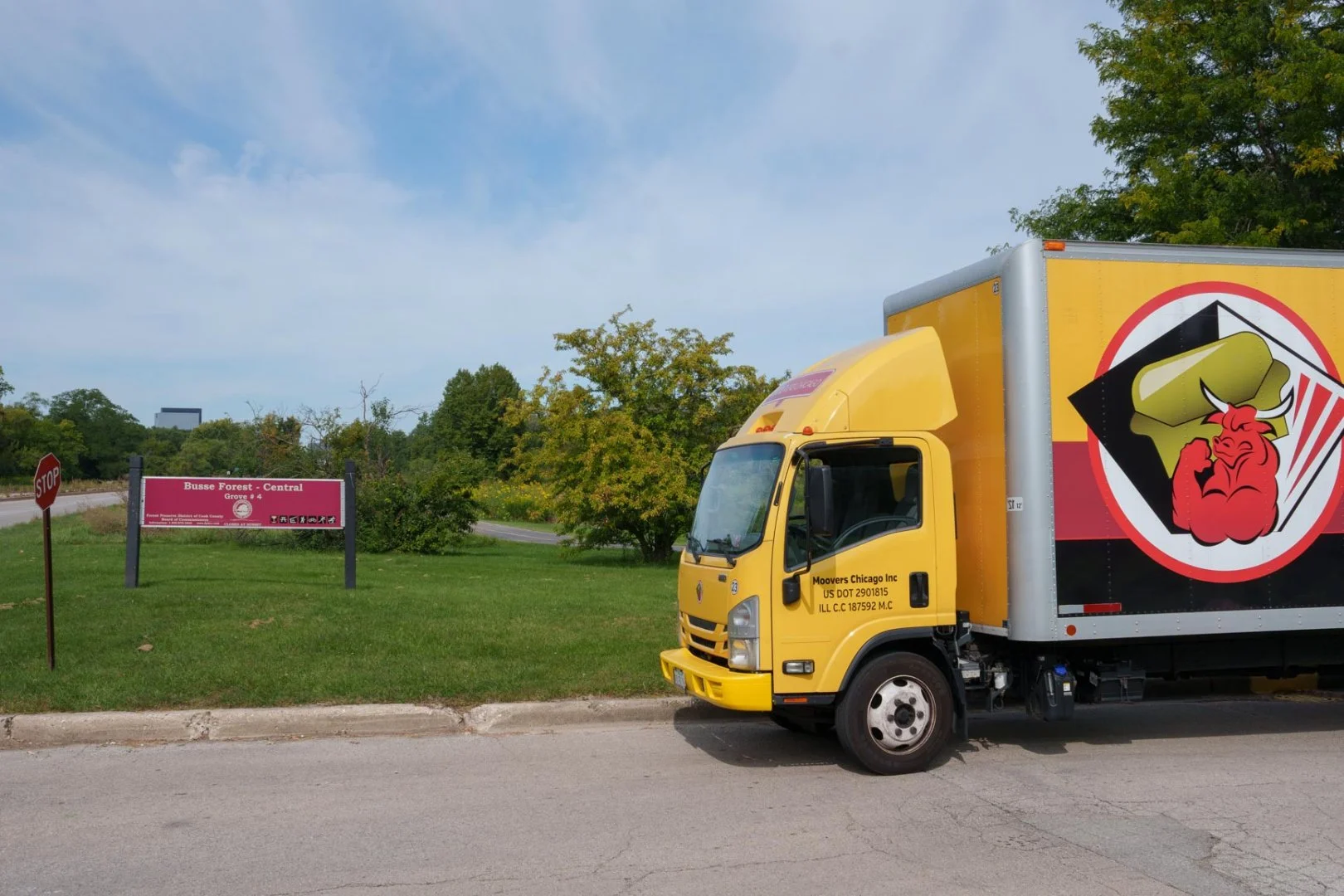 Moovers Chicago truck parked near a park, offering local and long-distance moving services in Elk Grove Village, IL.