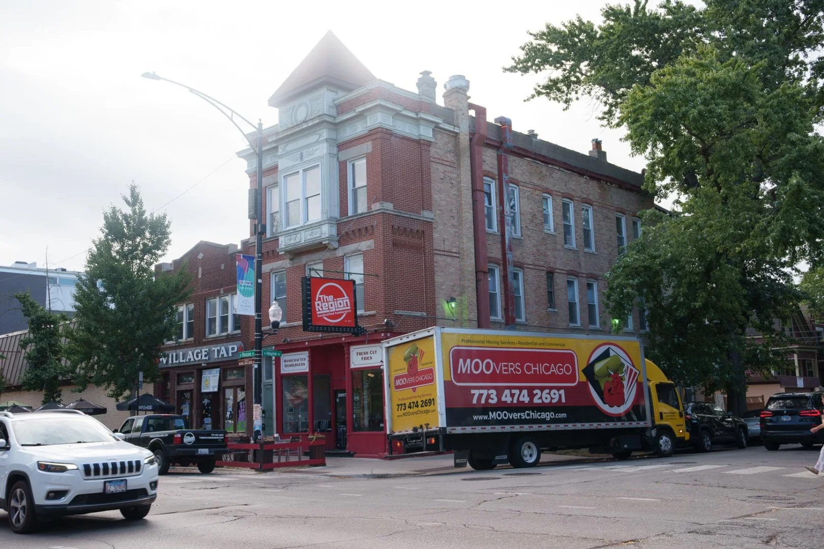 Moovers Chicago truck parked in Roscoe Village, local and long distance moving services.