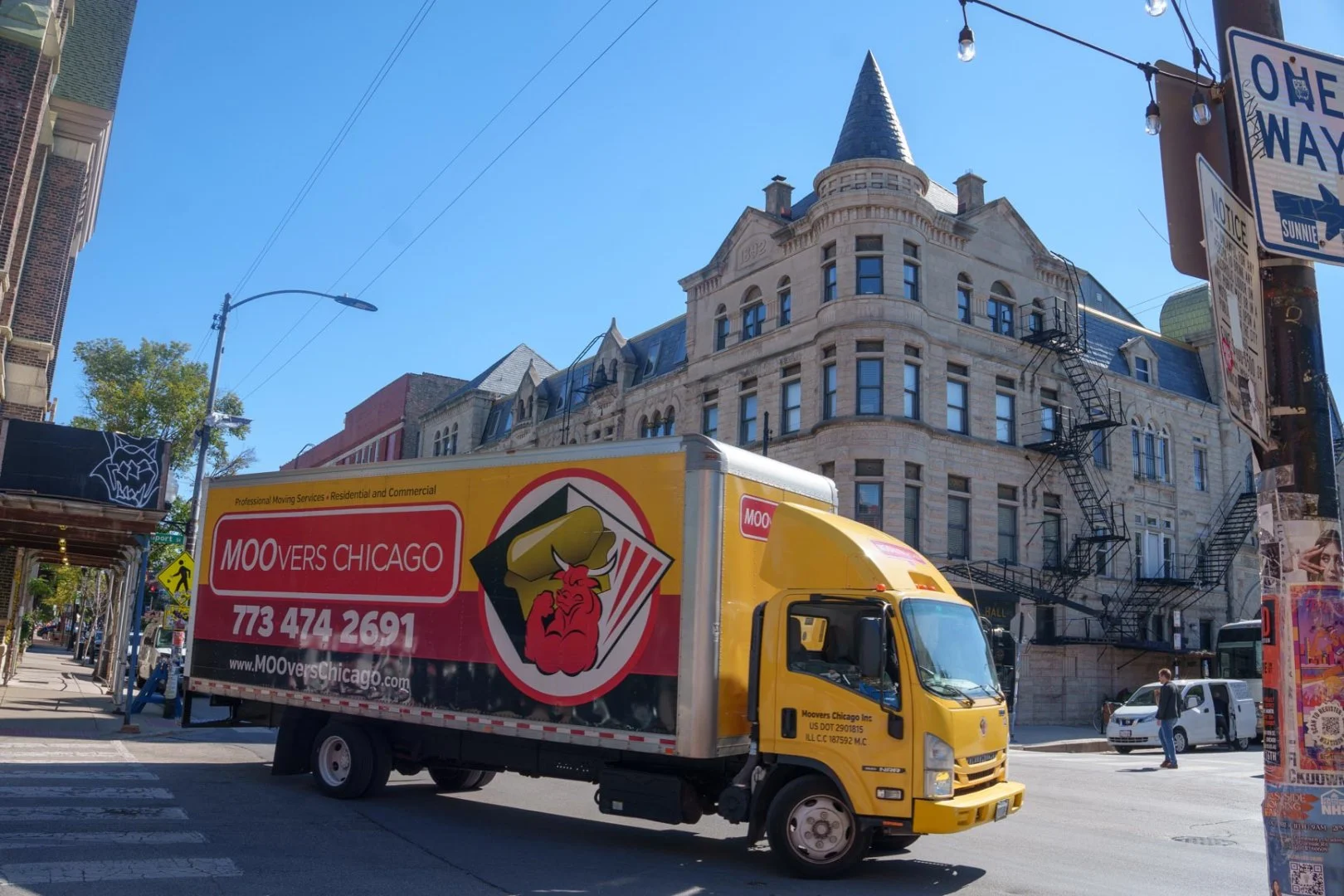 Moovers Chicago truck on a street in Pilsen, Chicago IL offering local and long-distance moving services.