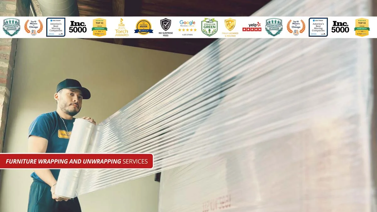 Mover wrapping furniture at Moovers Chicago, a trusted moving company.